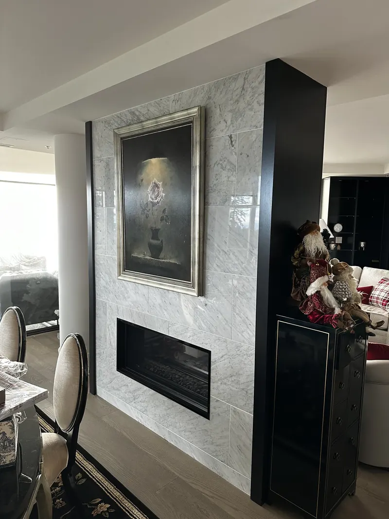 Before: the cracked marble fireplace surround and column