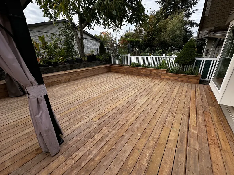 Large new cedar deck with built-in planter boxes